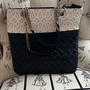 Chicos Black and White expandable Tote Bag  red lining.  12” x 13” and 5” deep